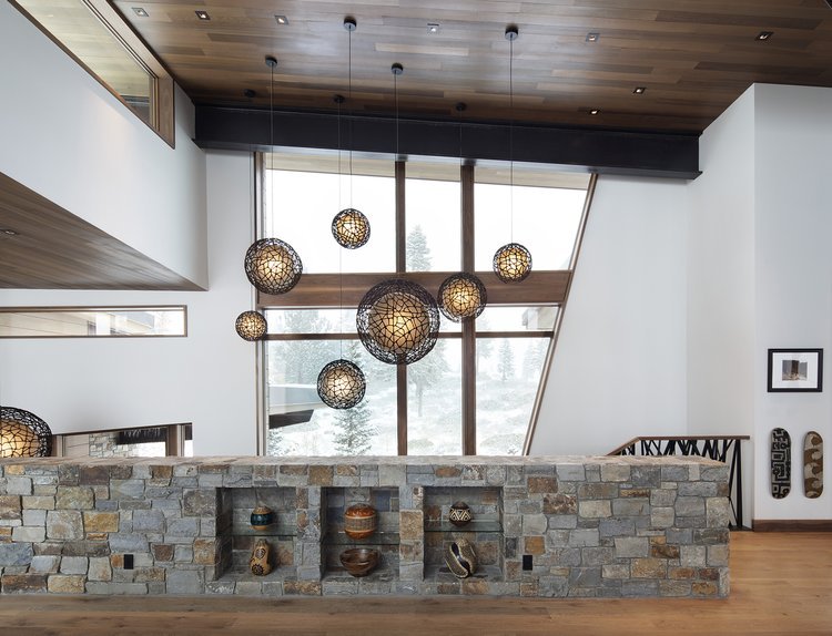 Modern Interior with Stone Wall and Unique Lighting in Mammoth Lakes, CA