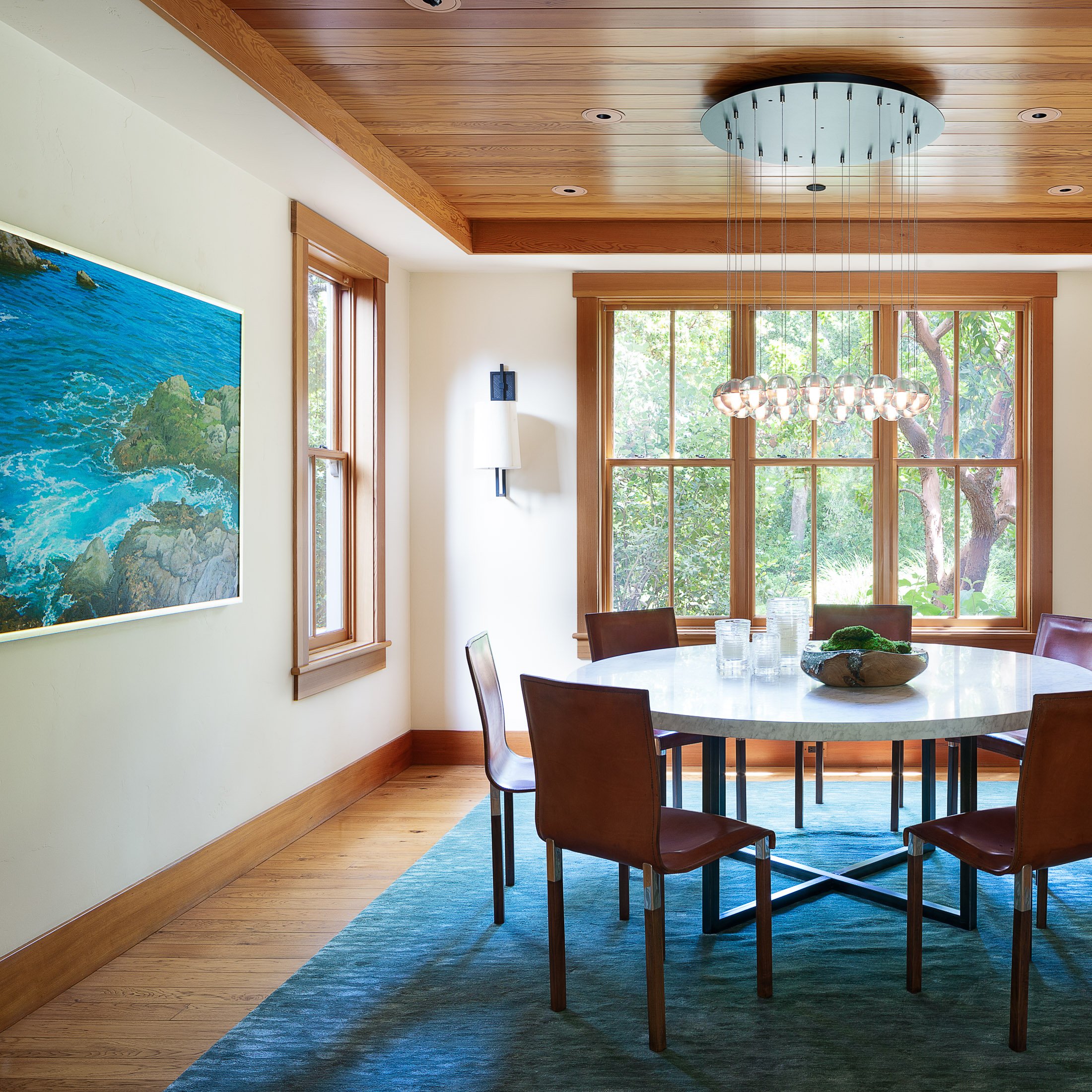 Elegant Dining Room with Natural Light and Modern Chandelier in Woodside, CA