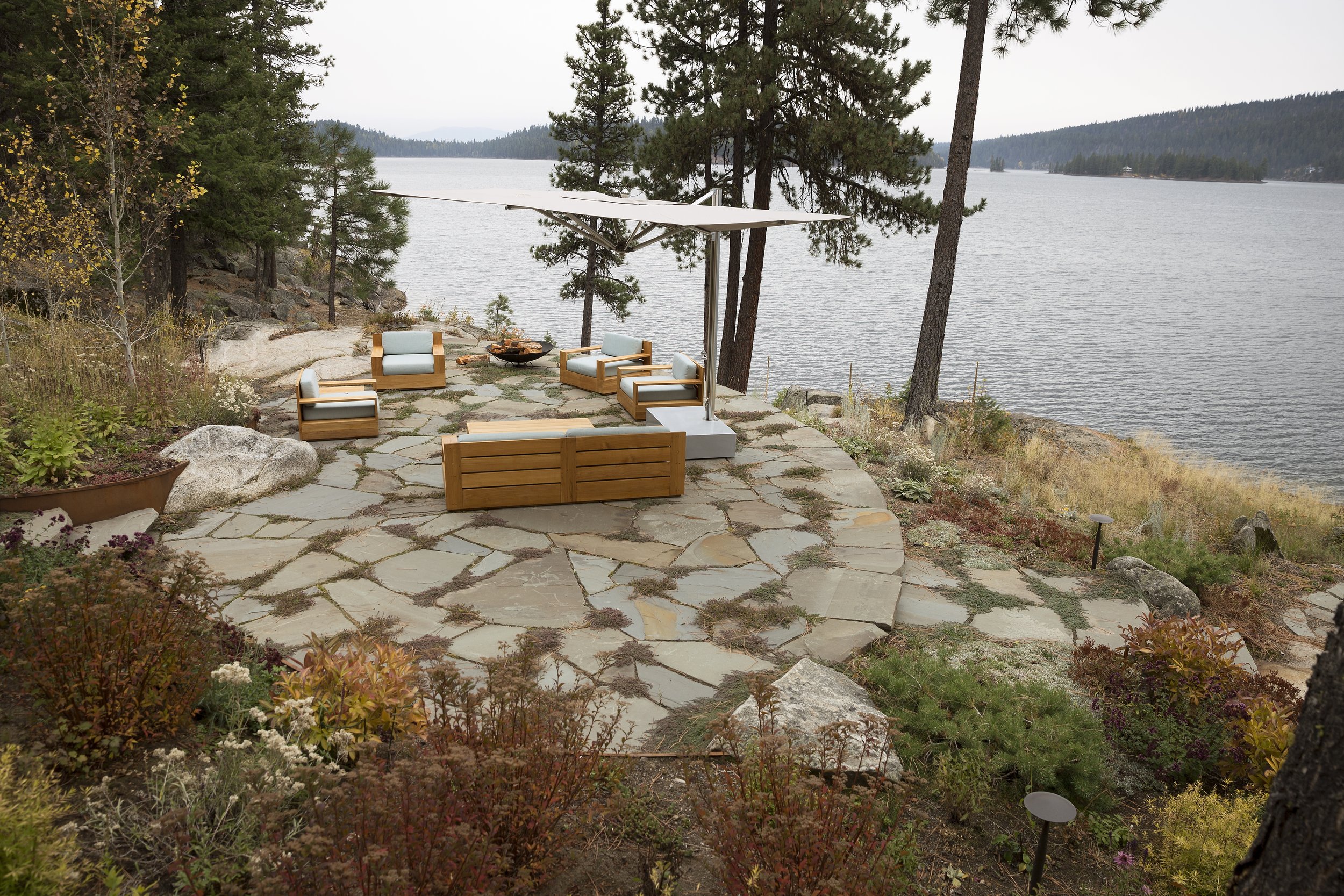 Lakeside Patio with Modern Furniture and Stone Flooring at McCall, Idaho Lake