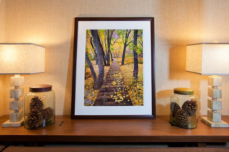 Decorative Table with Framed Artwork and Lamps in Mammoth Lakes, CA