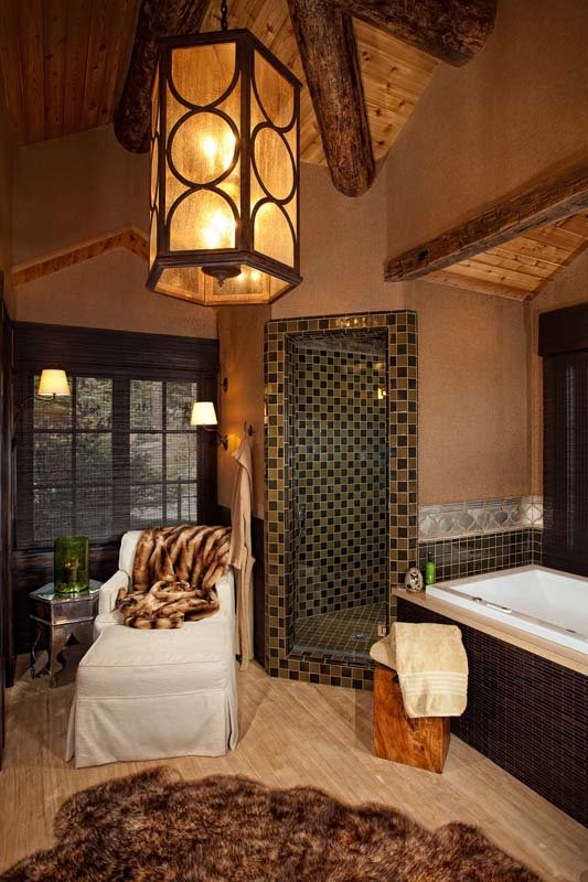 Luxurious Rustic Bathroom with Tiled Shower and Cozy Seating in Mammoth Lakes, CA