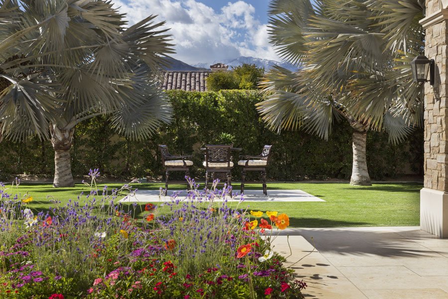 Garden Seating Area with Flowering Plants in Palm Desert, CA Home