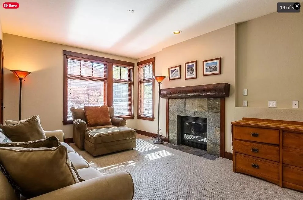 Juniper Crest Remodel - Before Living Room with Fireplace and Wooden Furniture