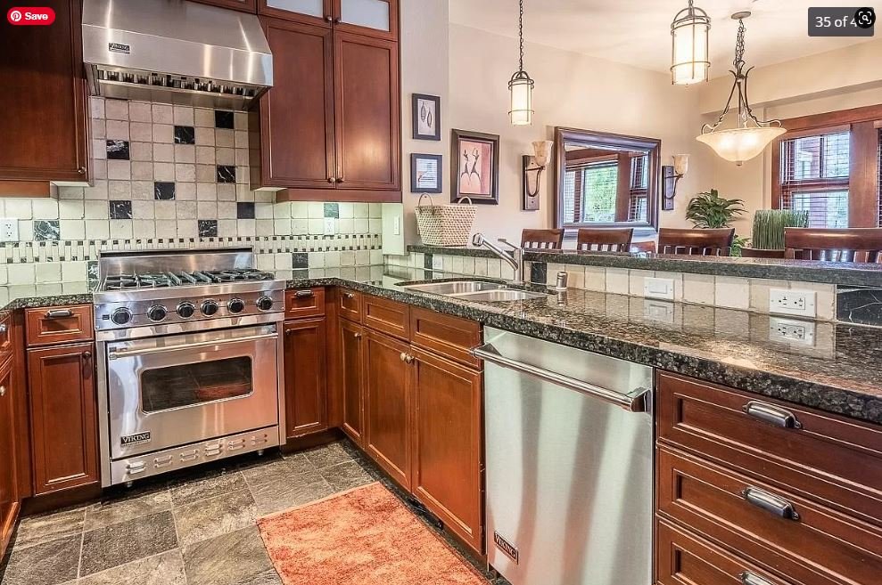 Juniper Crest Remodel - Before Kitchen with Dark Wood and Granite Countertops