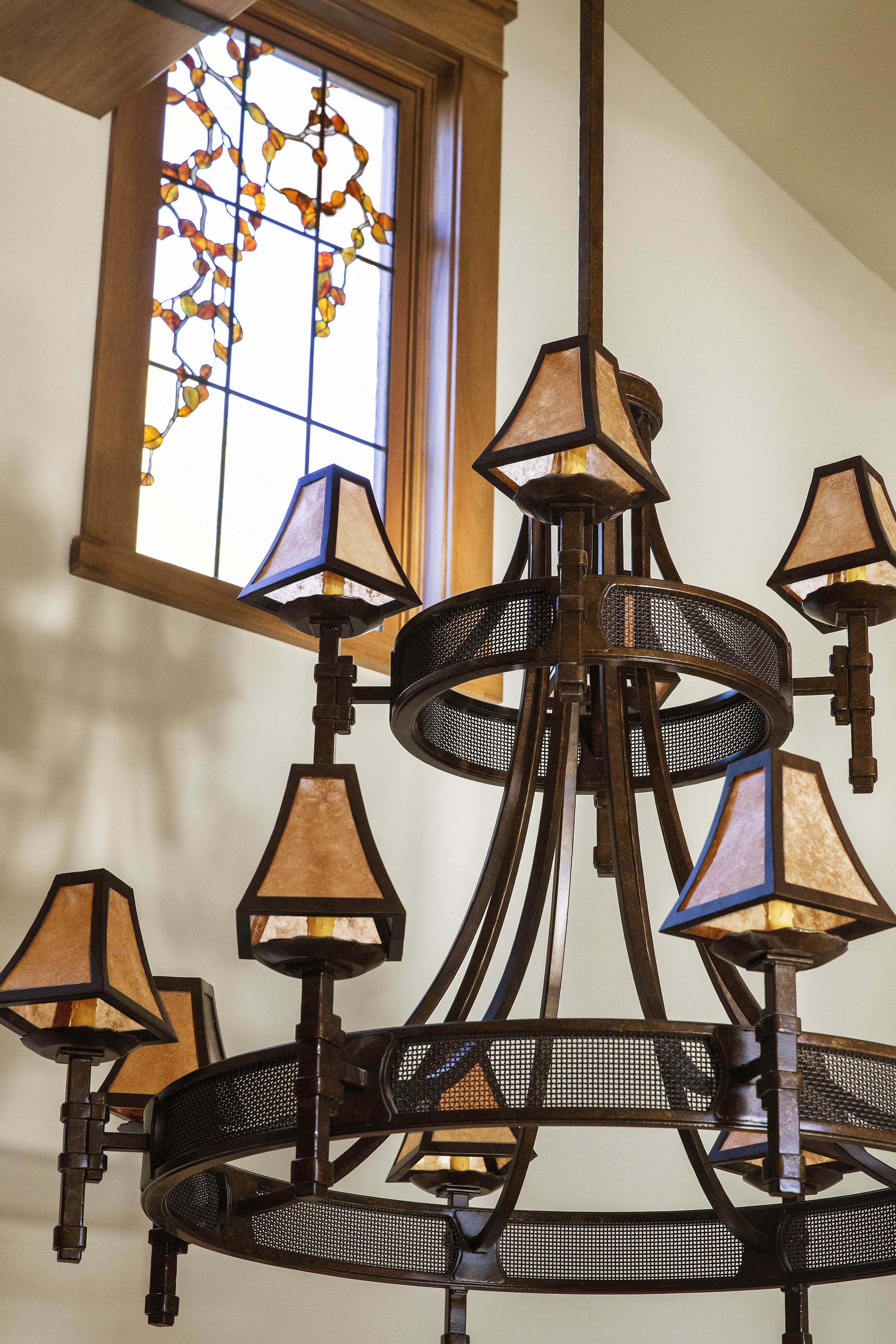 Rustic Chandelier and Stained Glass in Tahoe Martis Camp, CA Stairwell