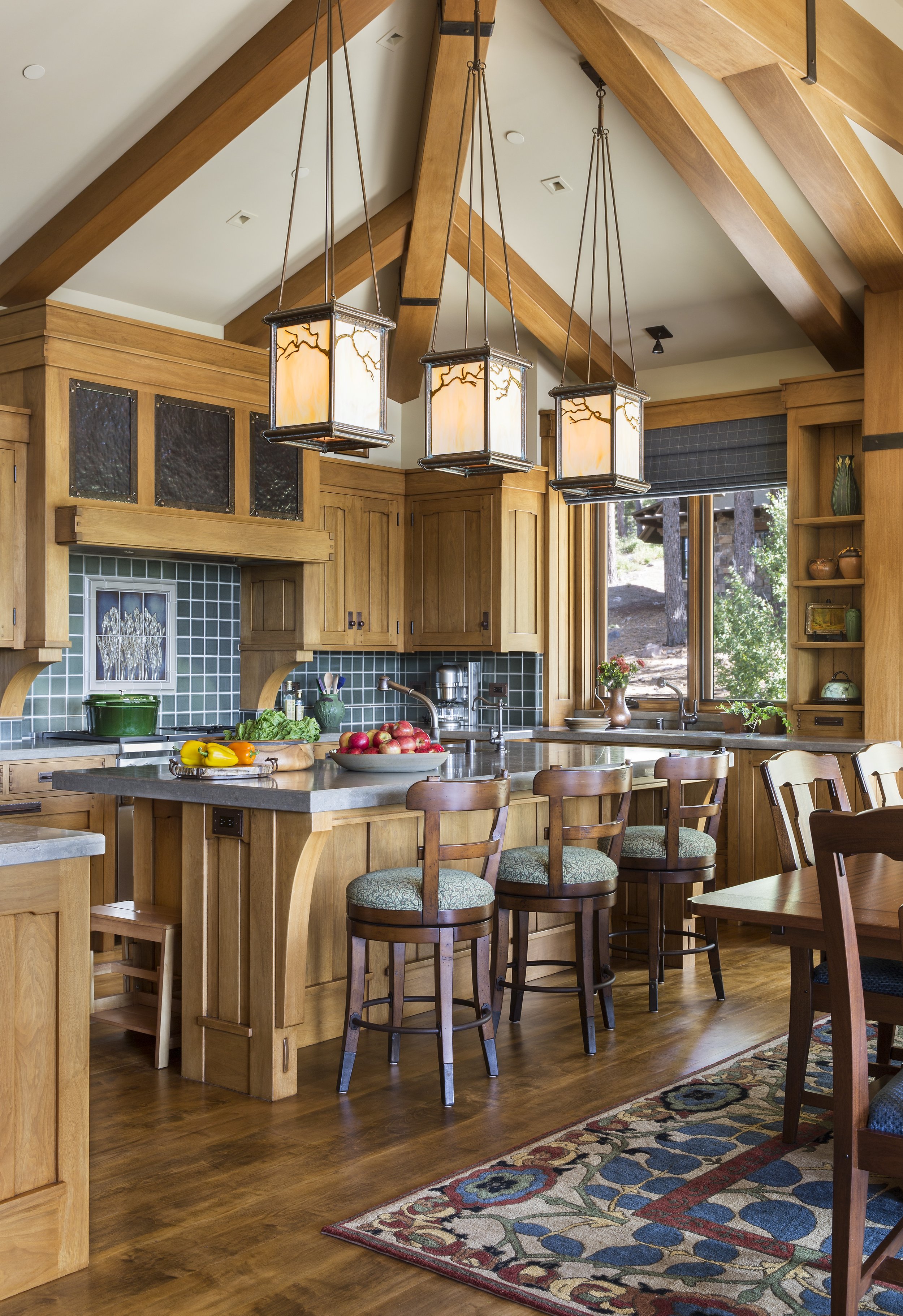 Rustic Kitchen with Island and Custom Tile Backsplash in Tahoe Martis Camp, CA Home