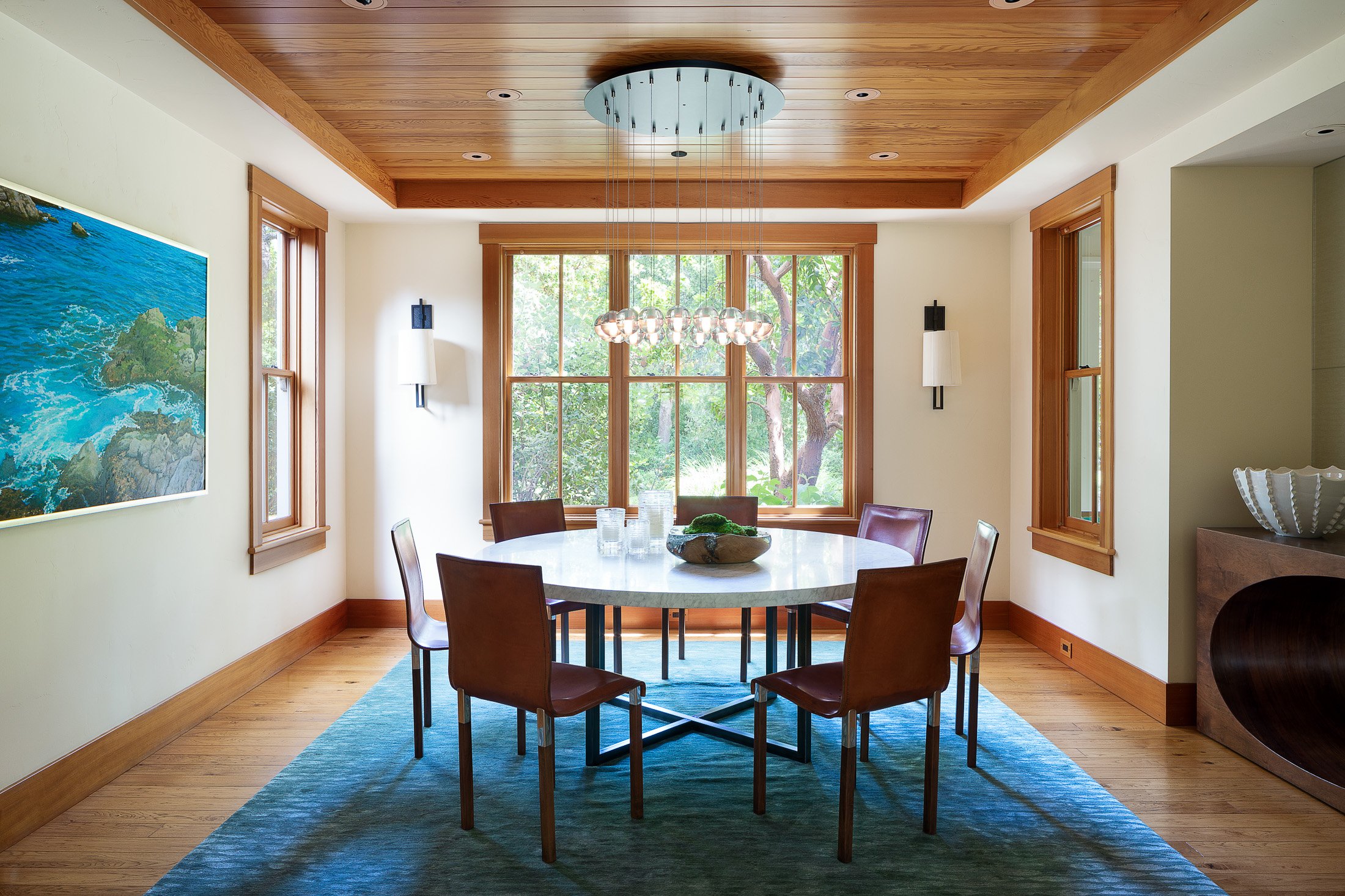 Elegant Dining Room with Natural Light and Modern Chandelier in Woodside, CA