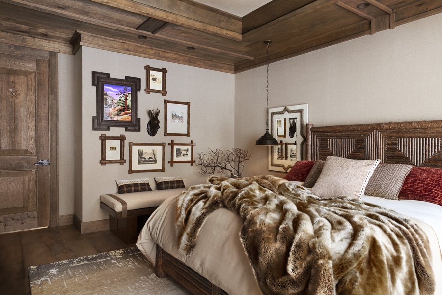 Modern Rustic Bedroom with Gallery Wall and Fur Bedding in Mammoth Lakes, CA