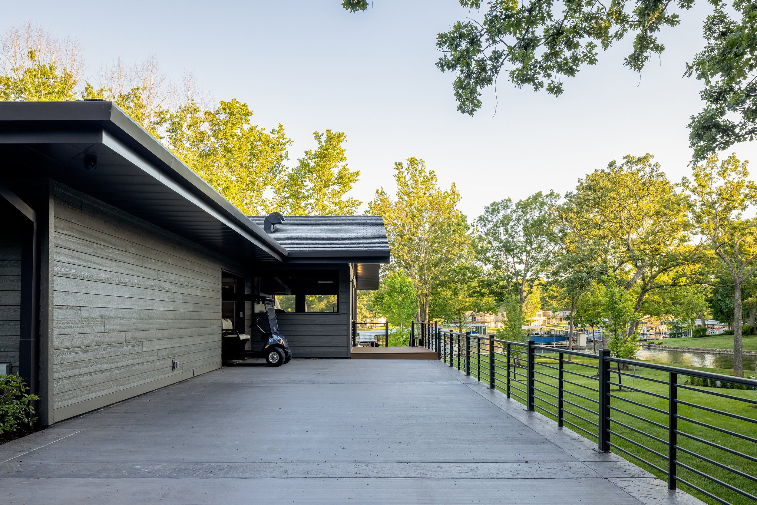 modern-lake-house-driveway-ozarks-golf-cart-parking.jpg