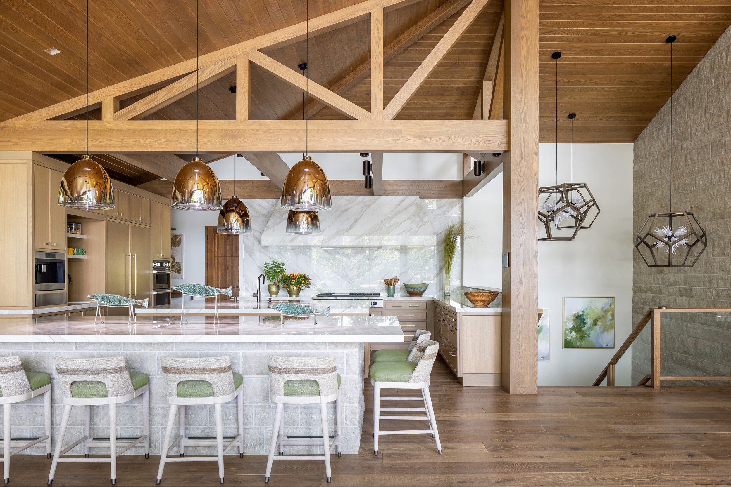 lakefront-modern-kitchen-exposed-beams-marble-backsplash.jpg
