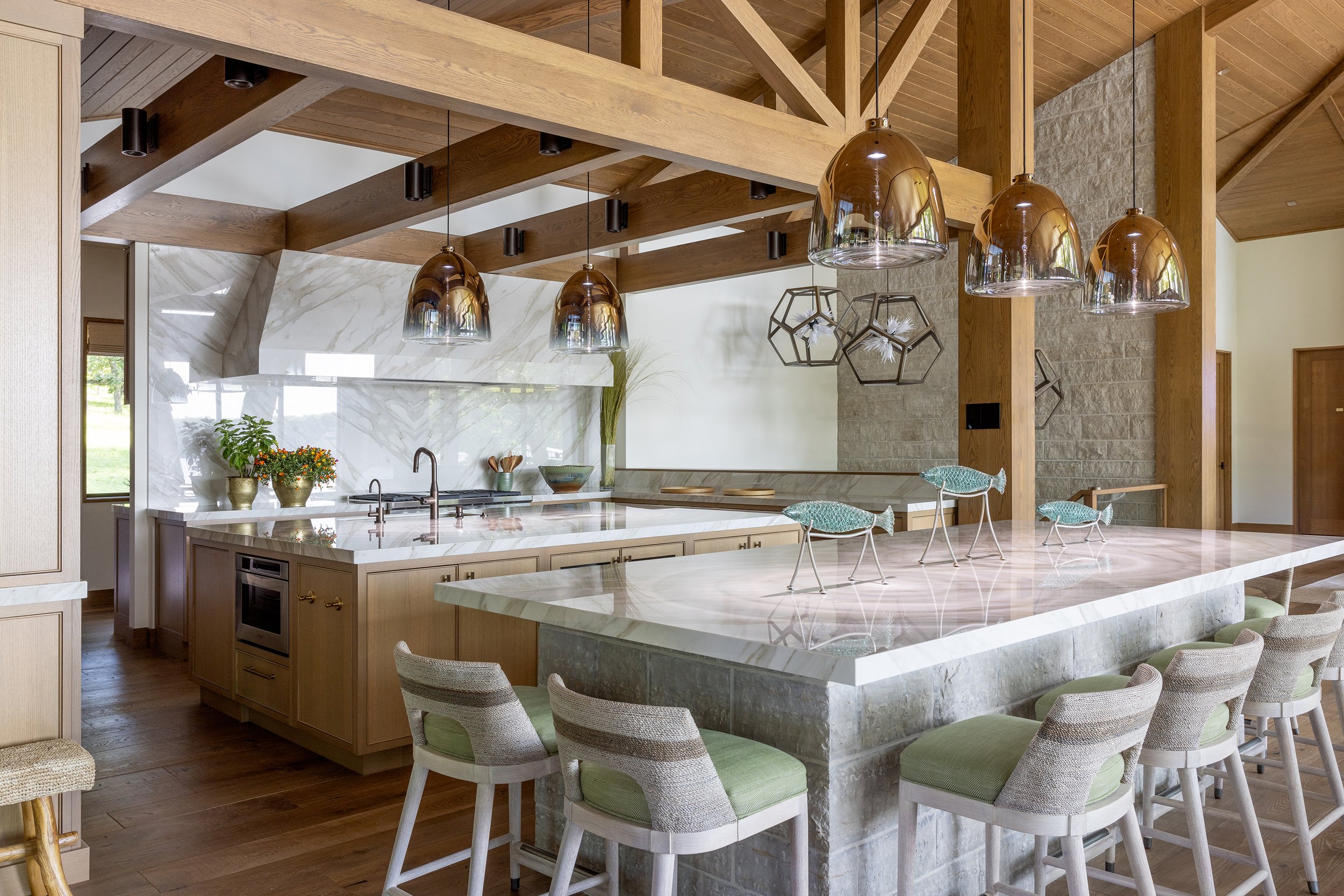 lakefront-modern-kitchen-large-island-marble-counters.jpg