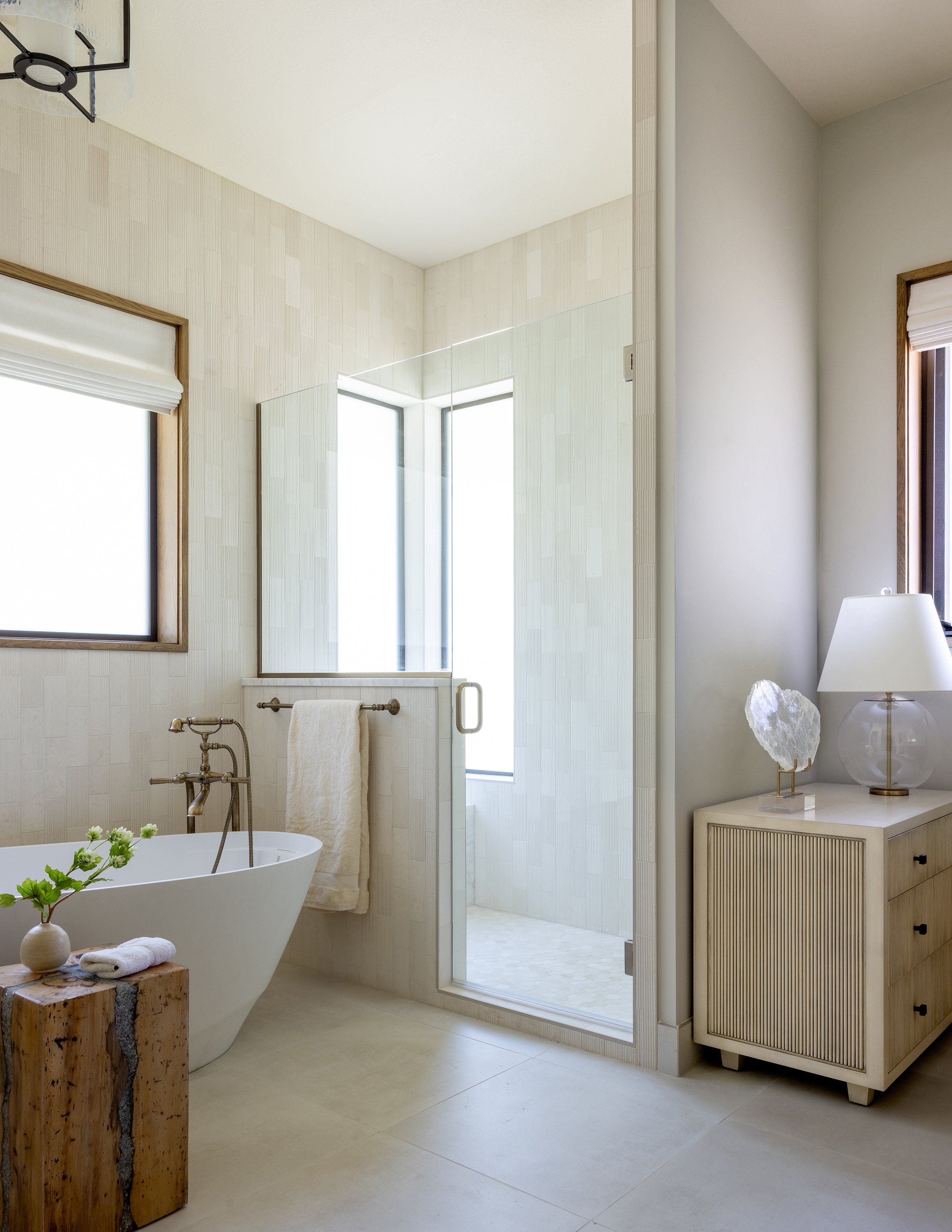 lakefront-primary-bathroom-modern-freestanding-tub.jpg