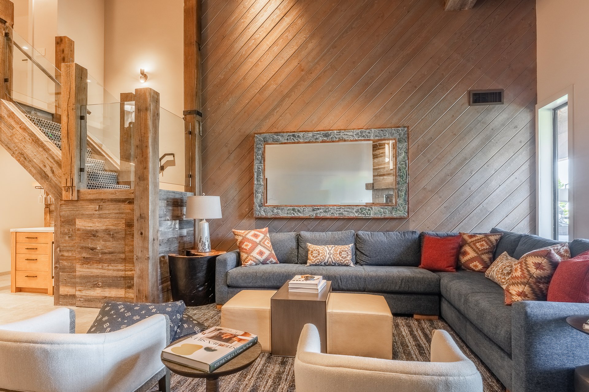 mammoth-lakes-living-room-wood-paneling-glass-staircase-the-bridges.JPG
