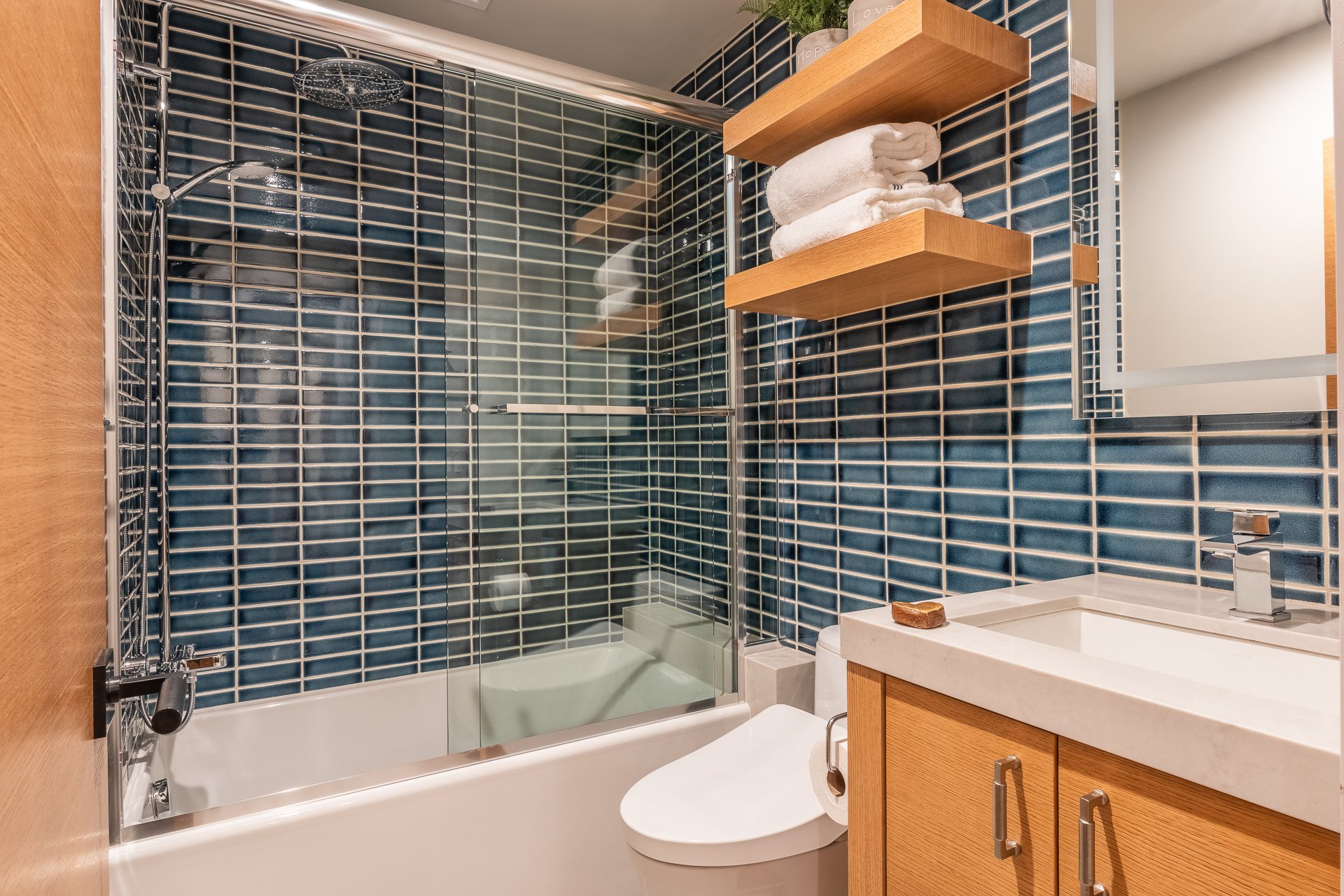 modern-bathroom-blue-tile-tub-shower-mammoth-lakes-the-bridges.JPG