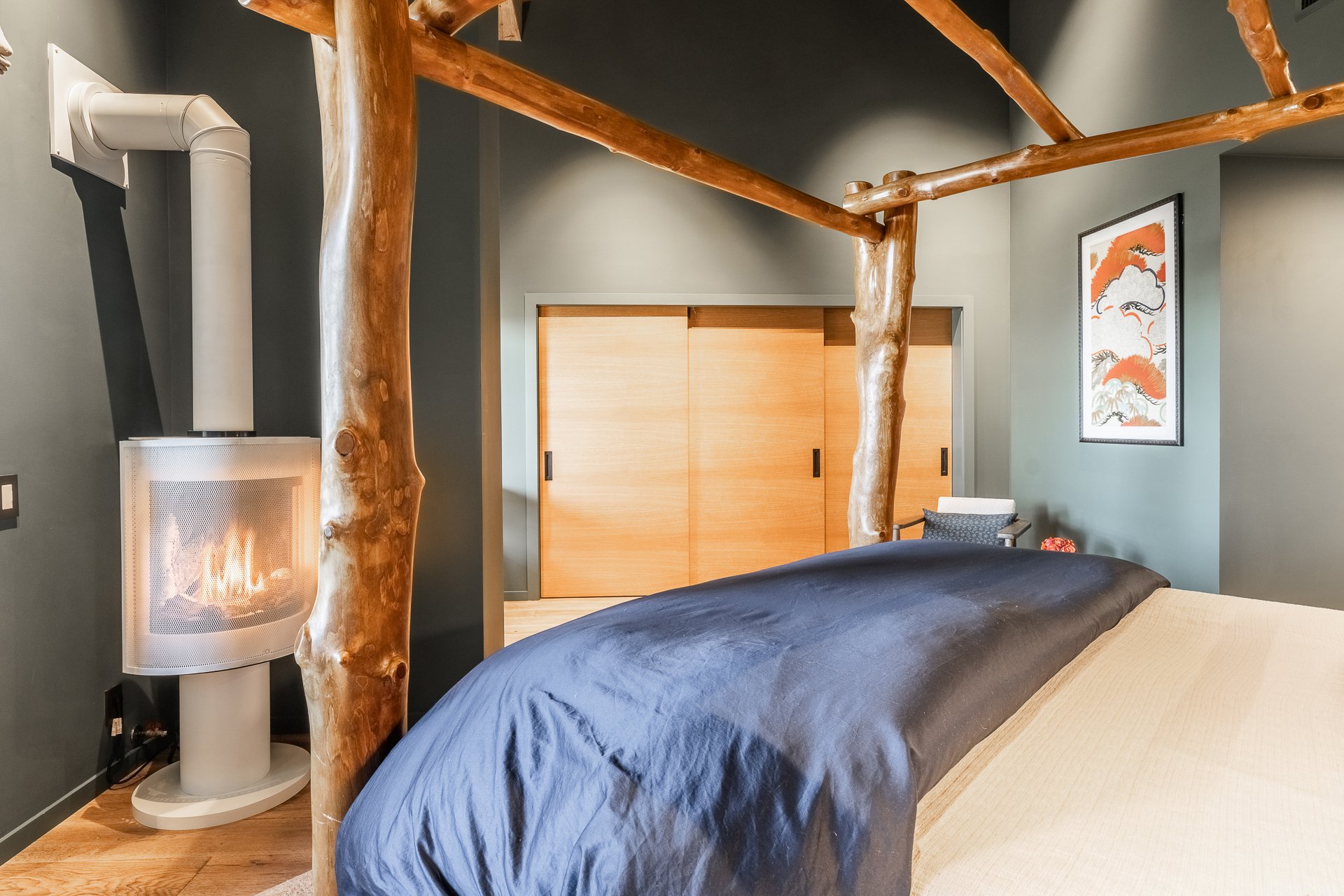 mammoth-lakes-bedroom-fireplace-log-bed-the-bridges-remodel.JPG